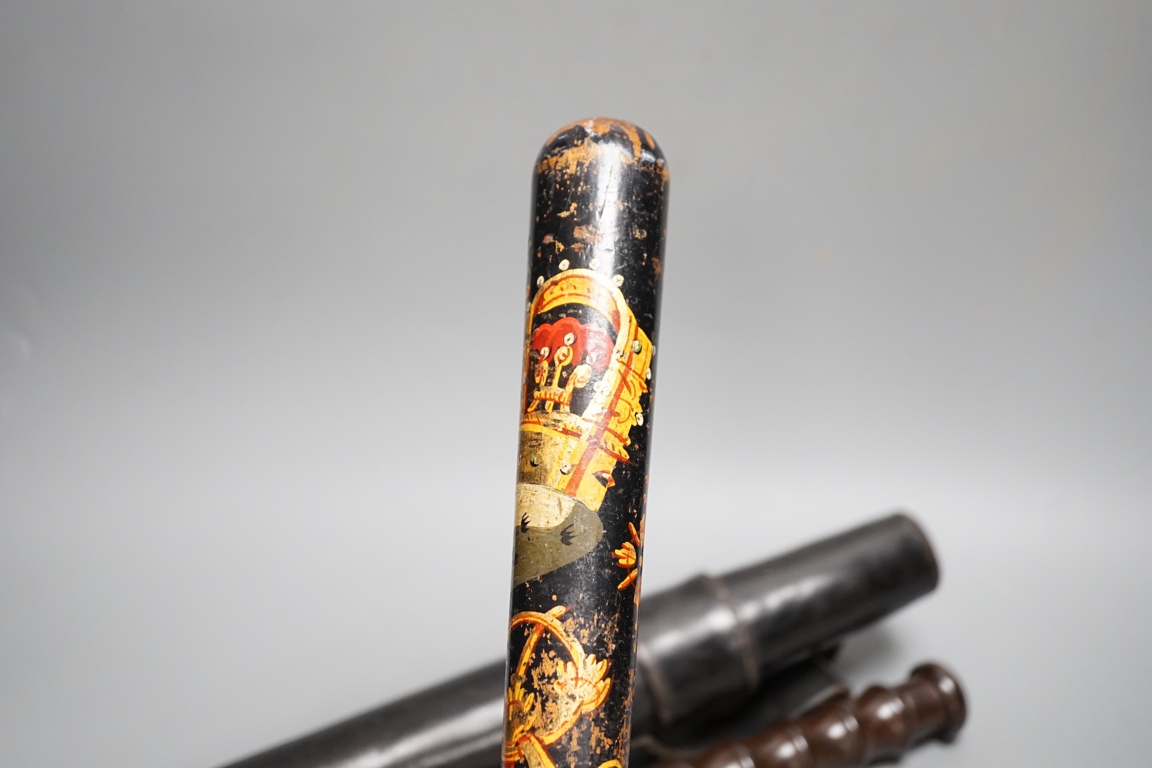 A Victorian painted wood ceremonial truncheon, 44cm and one other truncheon in leather case